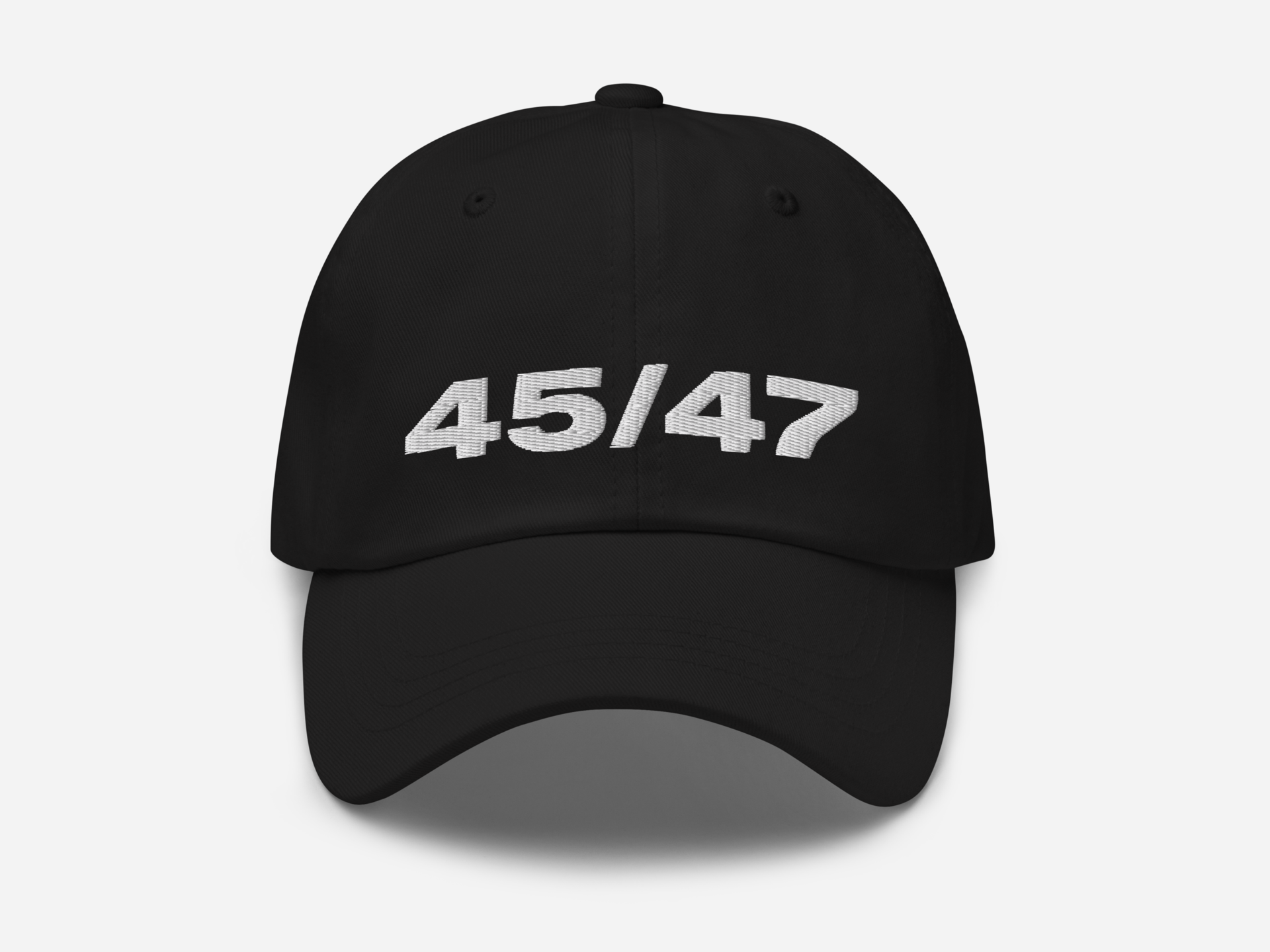 Black dad hat with '45/47' embroidered in bold white text on the front, displayed against a white background