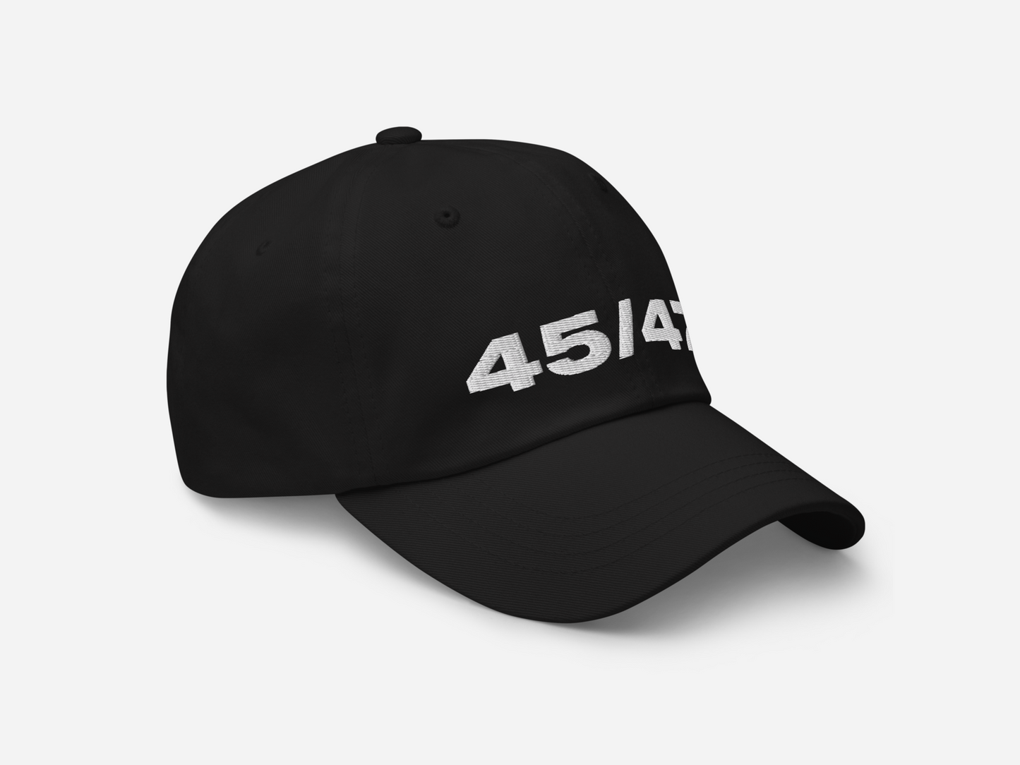 Black dad hat with '45/47' embroidered in bold white text, displayed at a right-angled front view on a white background