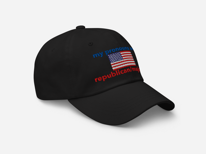 A black dad hat featuring "my pronouns are republican/majority" embroidery with detailed a American flag design, shown from the right-front angle, emphasizing the clean, adjustable strap, structured fit and highlighting the curved brim and stitching details